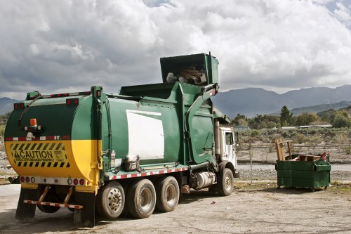 Team managing waste disposal at a commercial site in South West London